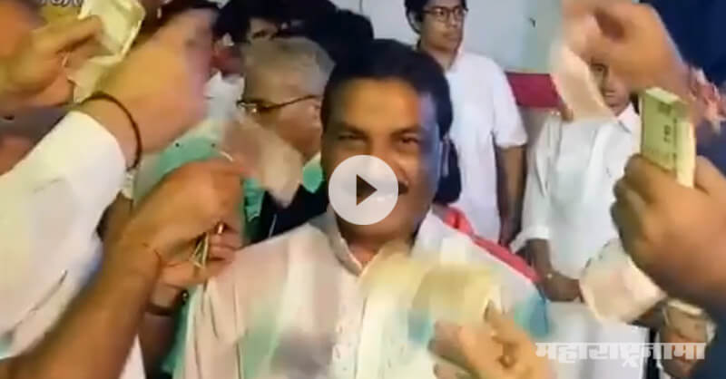 Ganesh mandal workers flying money on Congress MLA Nazeem Khan