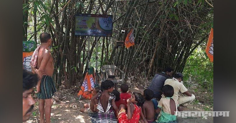 Villagers Listening, Amit Shah, On Led Screen Affixed, Bamboo Shrub